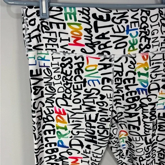 NWOT ATHLETA ELATION TRAIN 7/8
Tight Leggings PRIDE Graffiti words L - Picture 4 of 13
